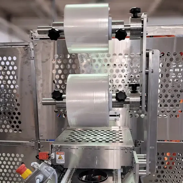 This is a 3D rendering of an FEMC Roller Drum Heat sealer for food packaging automation equipment.